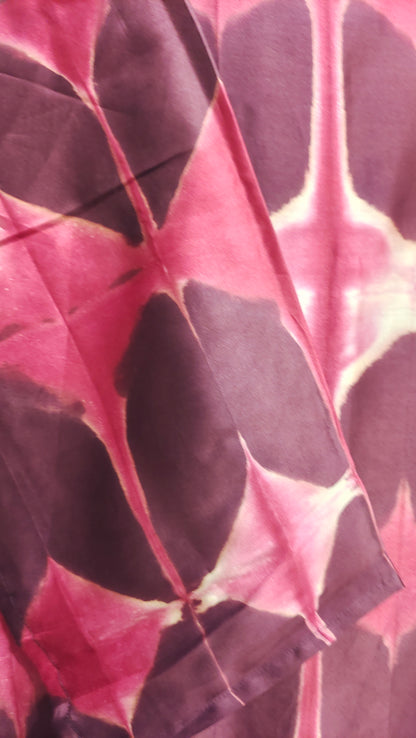 Close-up of pink and purple leaves with a blurred background