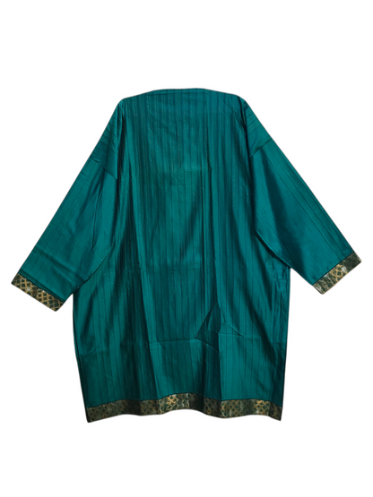 Teal kurta with gold trim on a white background