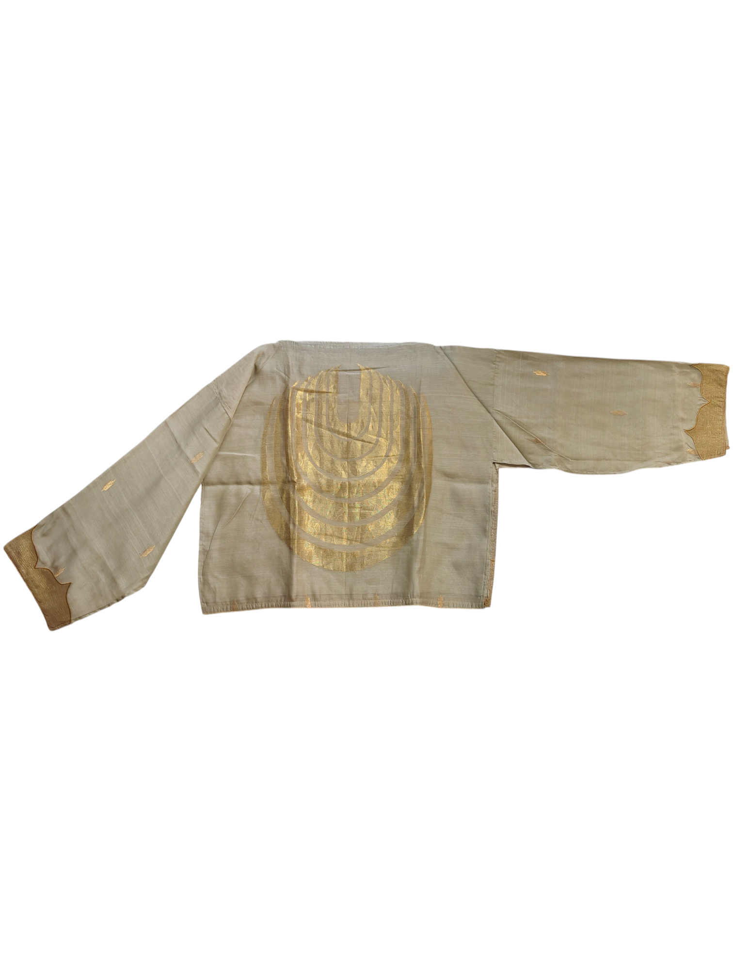 Traditional blouse with gold embroidery on a white background