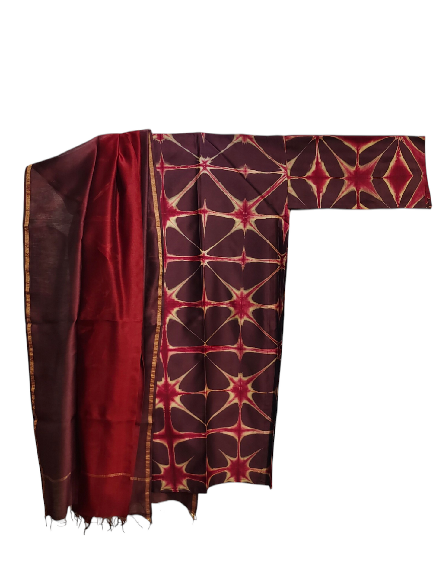 Red and gold patterned fabric on a white background