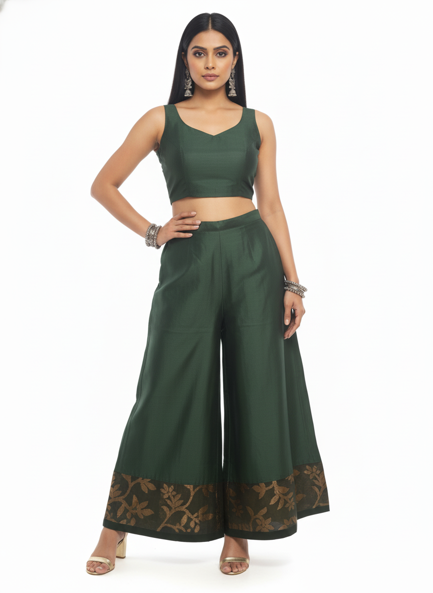 Woman wearing a green plazzo pant on a white background