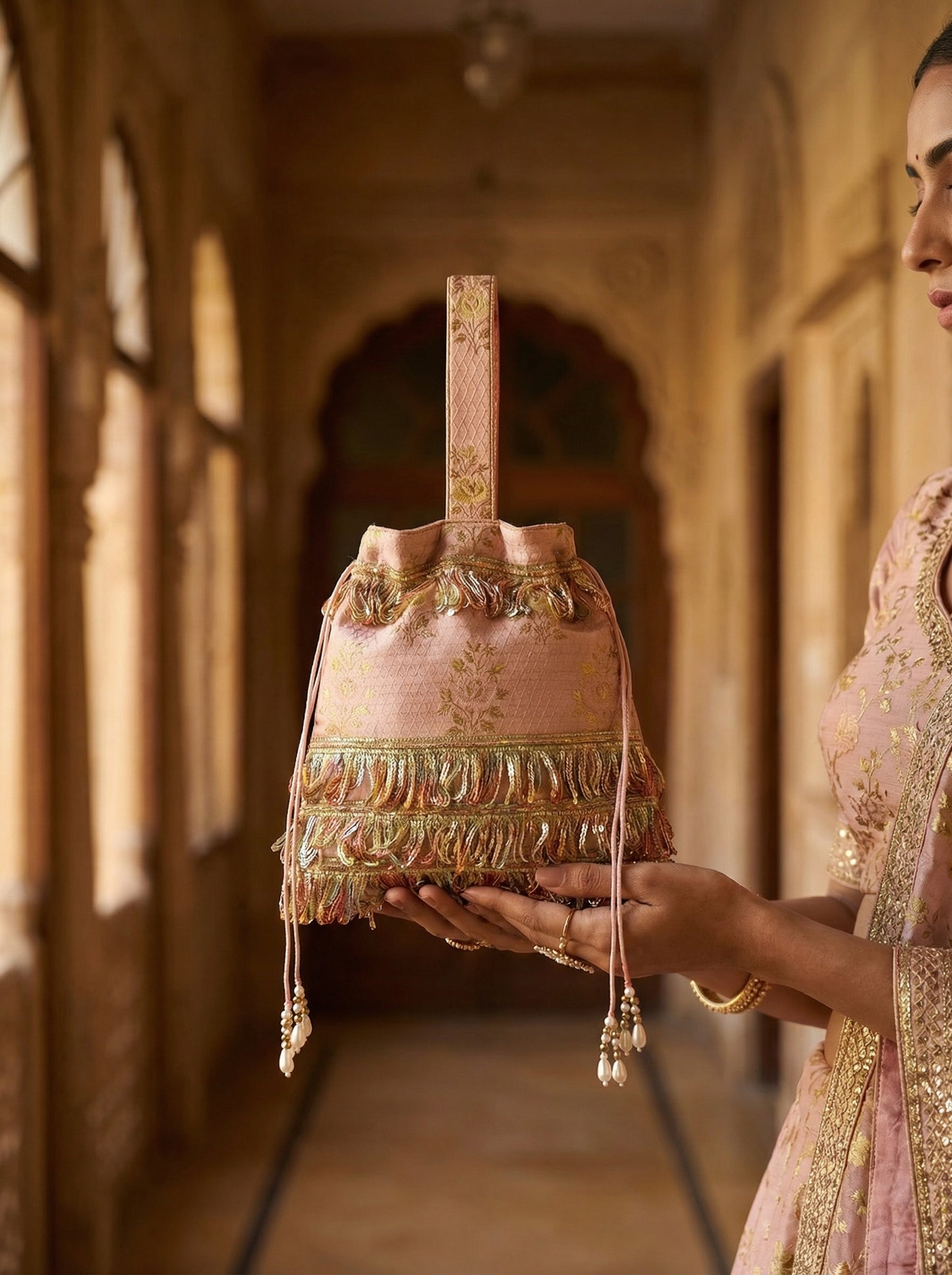 Saanjh Blush Gold Embroidered Fringe Potli